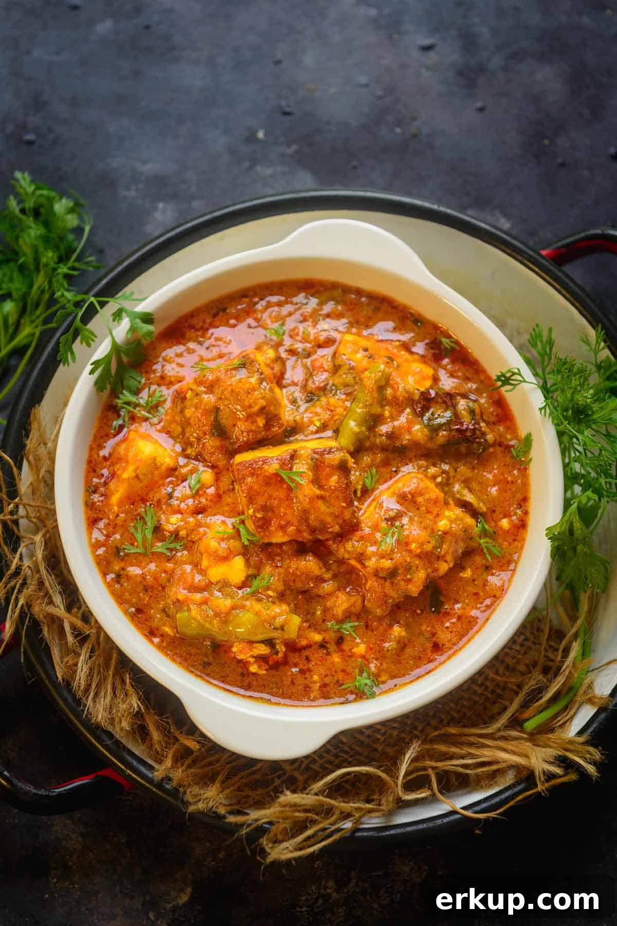 Dhaba style paneer masala served in a bowl.