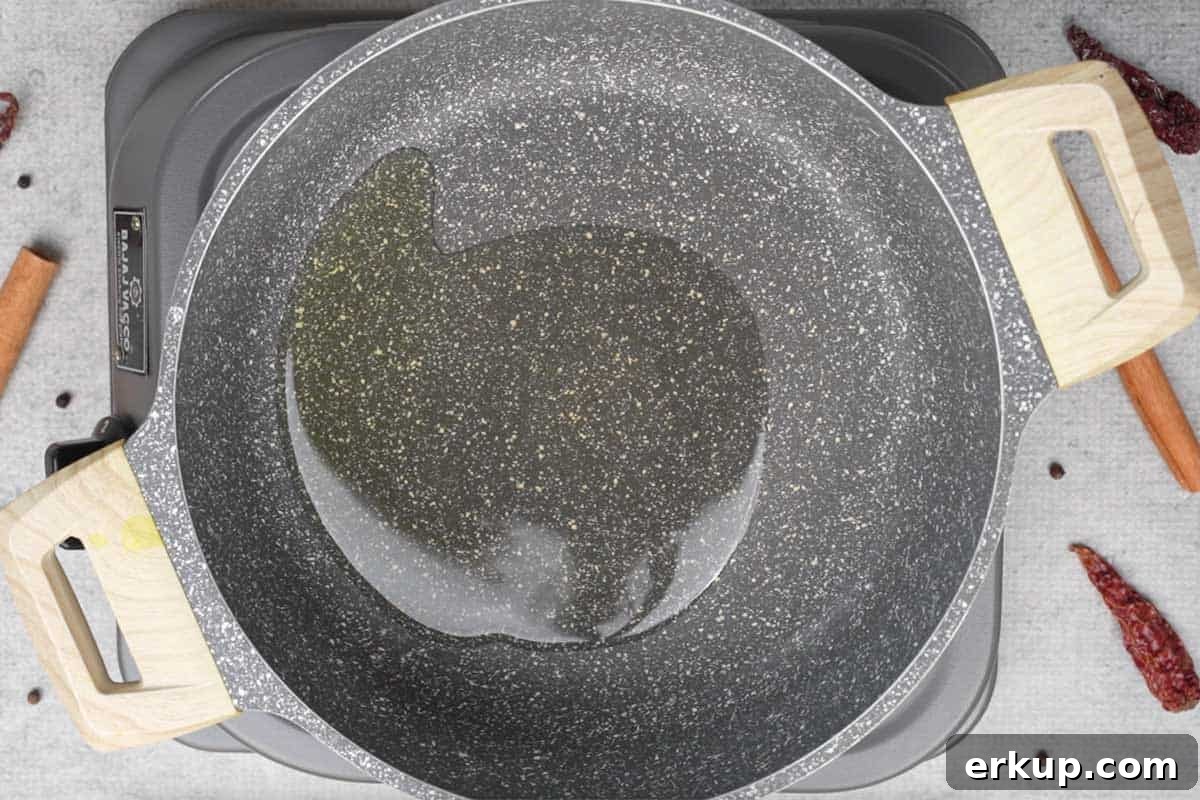 Oil heating in a pan.