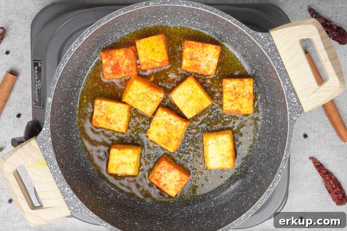 Paneer pieces arranged in a single layer.