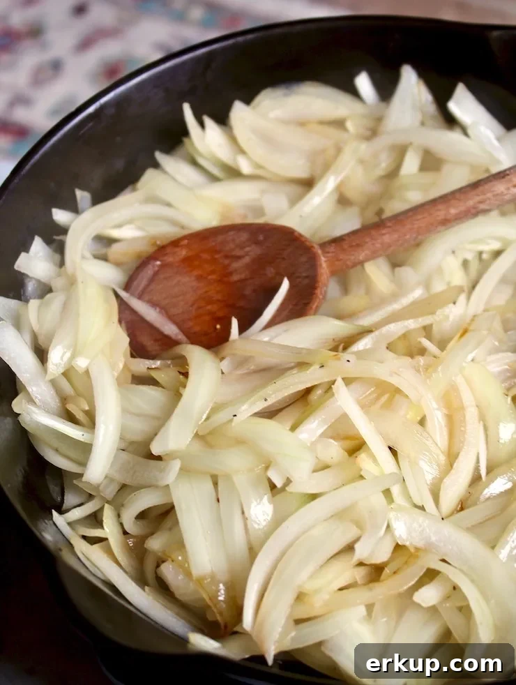 Diner-Style Patty Melts, onions caramelizing in skillet