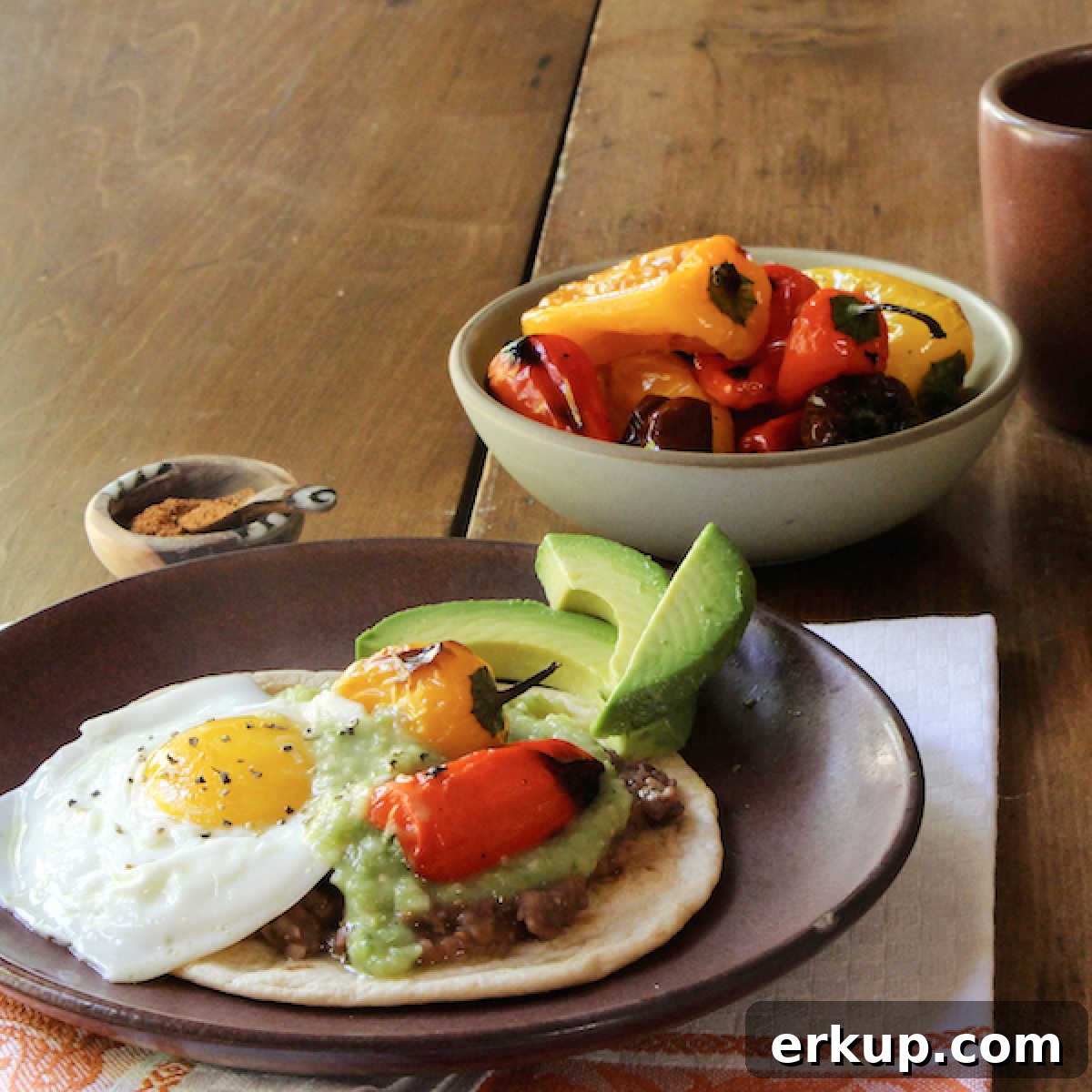 Week 5 Vegetarian Meal Plan for April 9 Huevos Rancheros served with roasted mini peppers