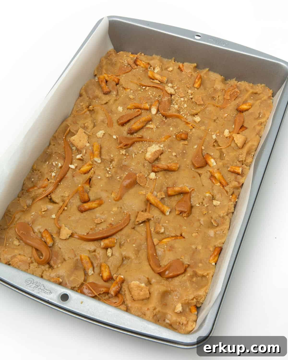 pan of unbaked caramel apple kitchen sink cookie