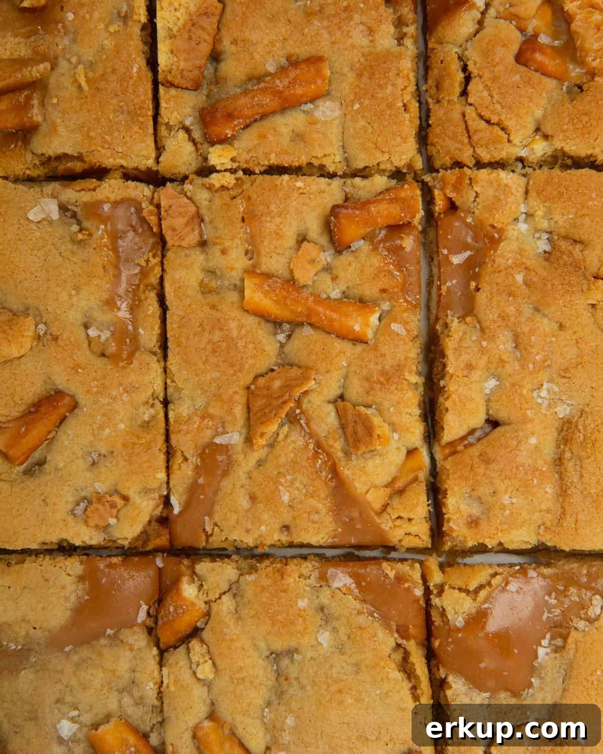 caramel apple kitchen sink cookie bars cut into rectangles