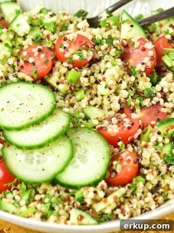 Up close view of a bowl of gluten-free tabbouleh (quinoa tabbouleh salad).