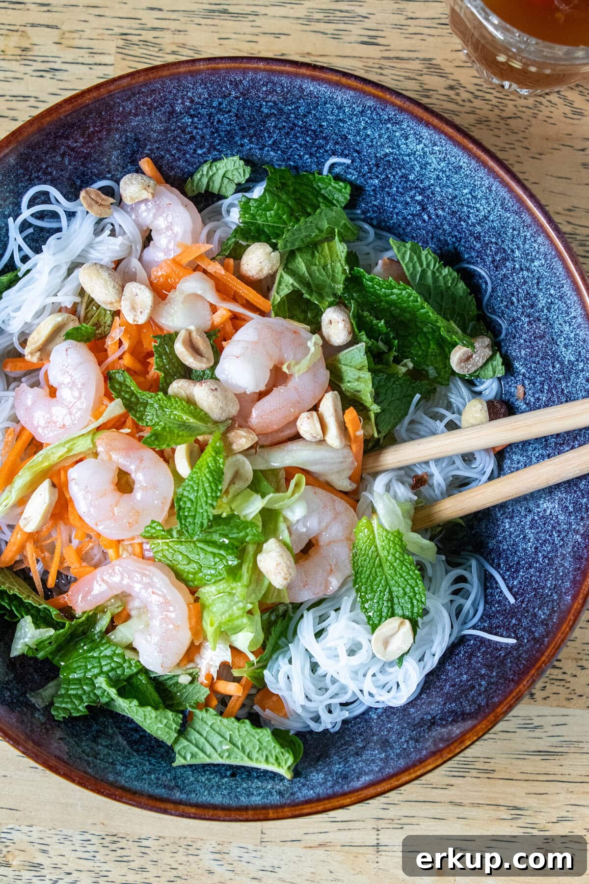Finished Bun Tom bowl with peanuts