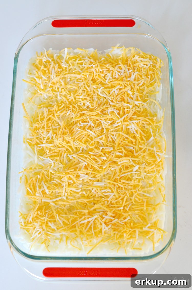 Shredded cheese on hash brown casserole