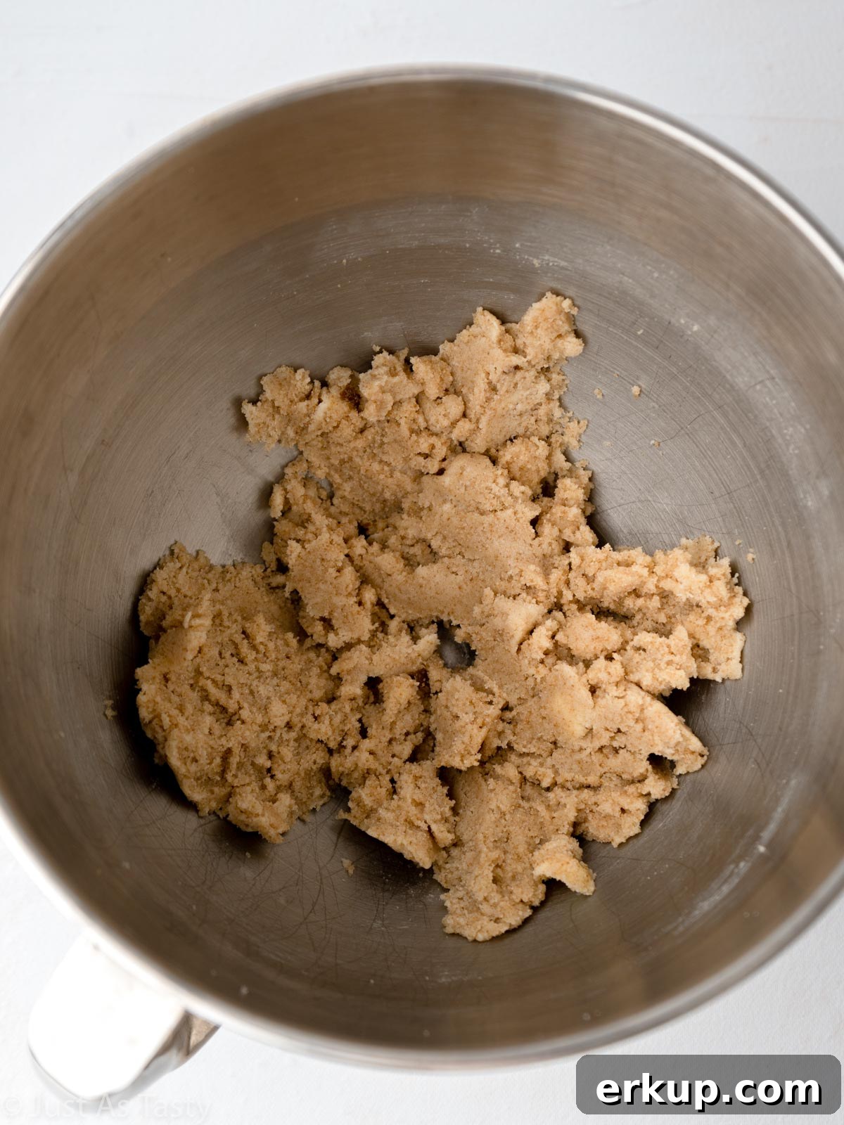 Sugar cookie bar dough in a bowl.