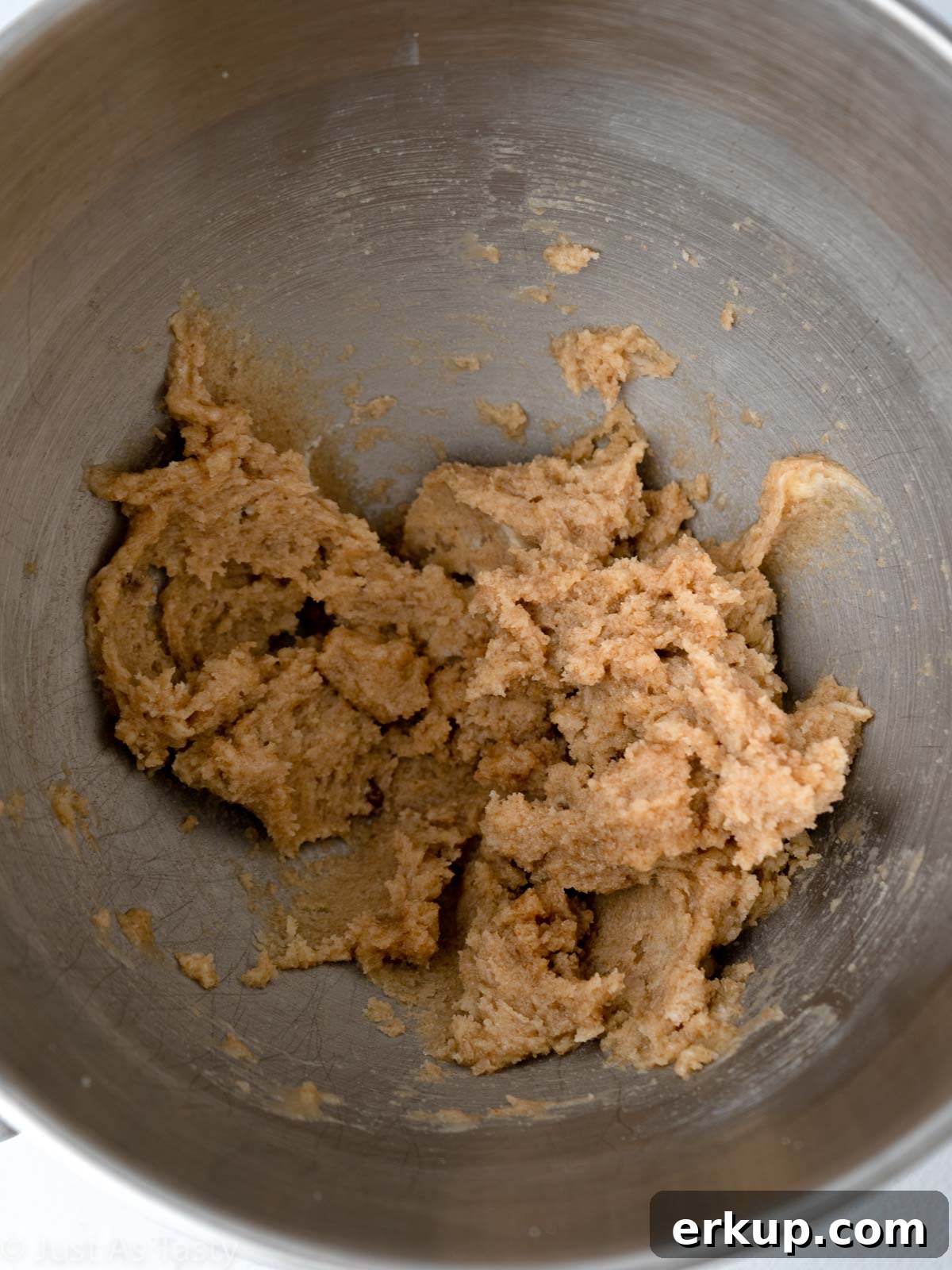 Sugar cookie bar dough in a bowl.