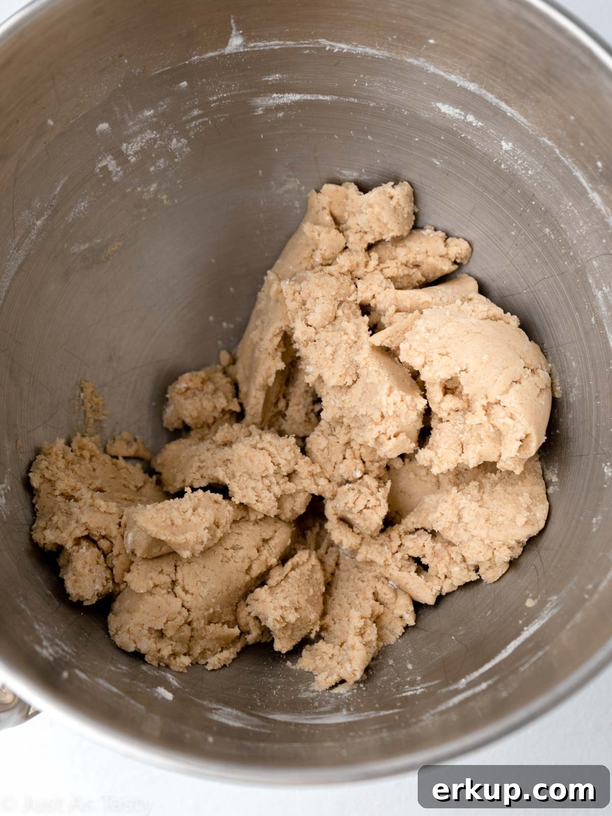 Sugar cookie bar dough in a bowl.