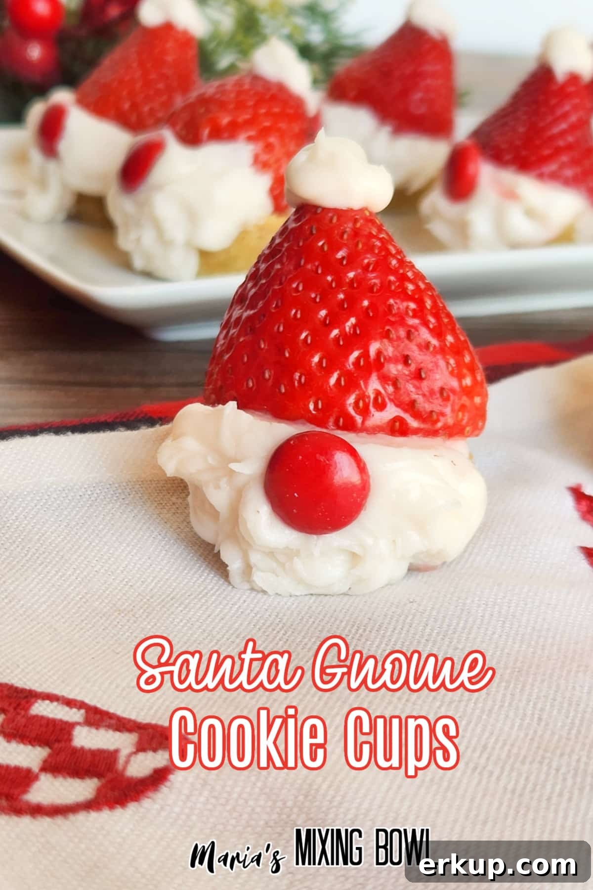 santa gnome cookie cup on a Christmas napkin