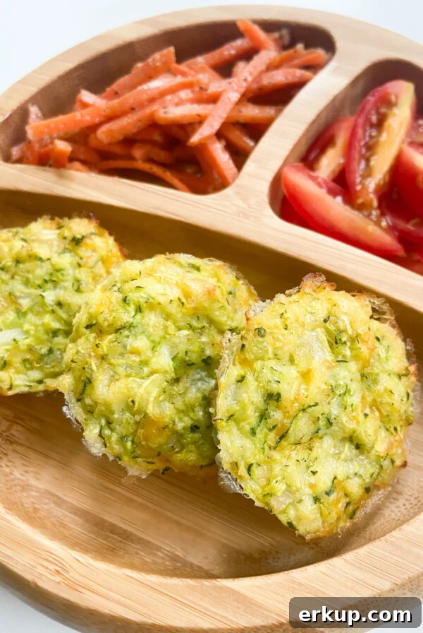 Zucchini bites served with carrots and tomatoes