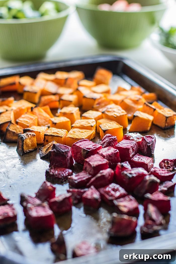 A pan of roasted butternut squash and beets.
