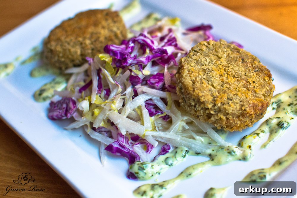 Dungeness Crab Cakes herbed remoulade, Belgian endive slaw