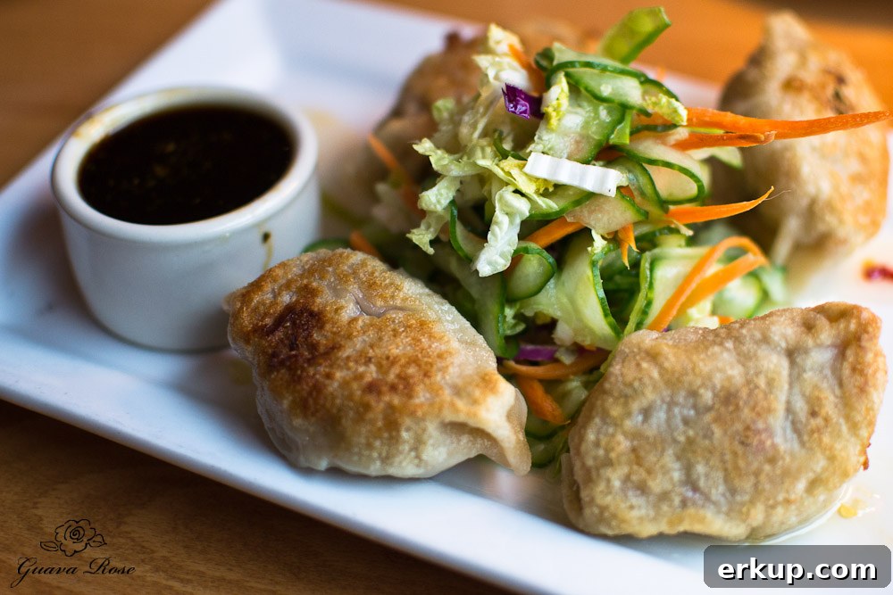 Pork-Kimchi Potstickers asian slaw, sweet chili drizzle, bulgogi dipping sauce
