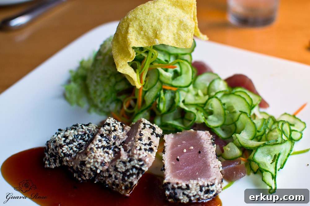 Ahi Tuna Two Ways: sesame crusted, seared rare, wakame sticky rice, lime marinated sashimi and cucumber salad