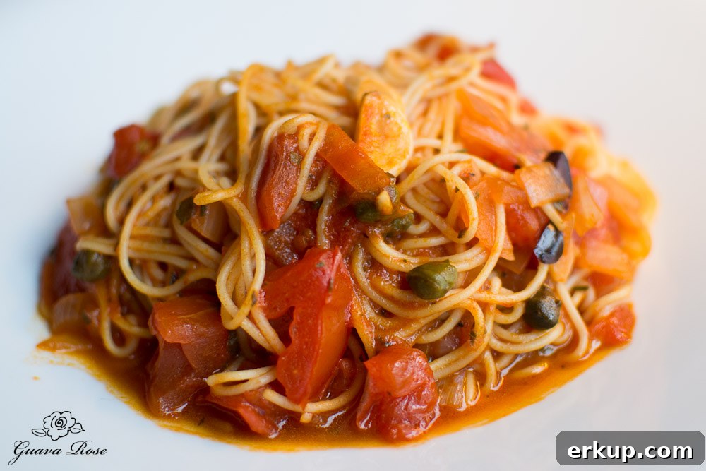 Capellini Provencal: angel hair pasta tossed with tomatoes, garlic, herbs, capers and olives