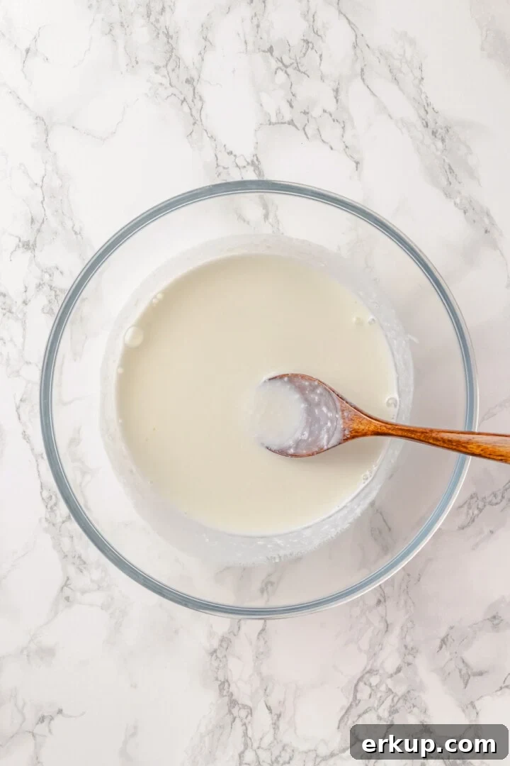 Overhead view of buttermilk mixture for protein pancakes