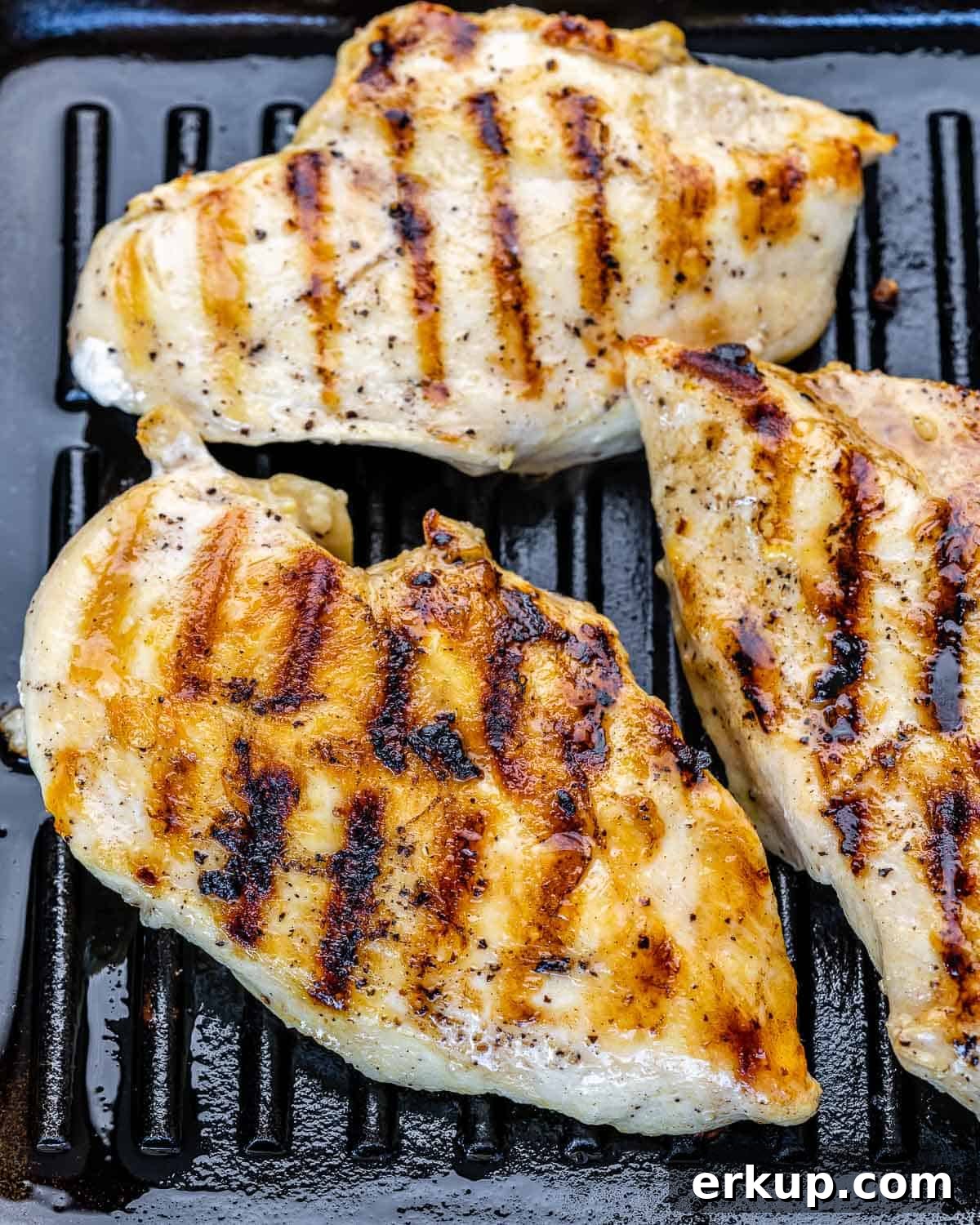 grilled chicken breasts on grill pan