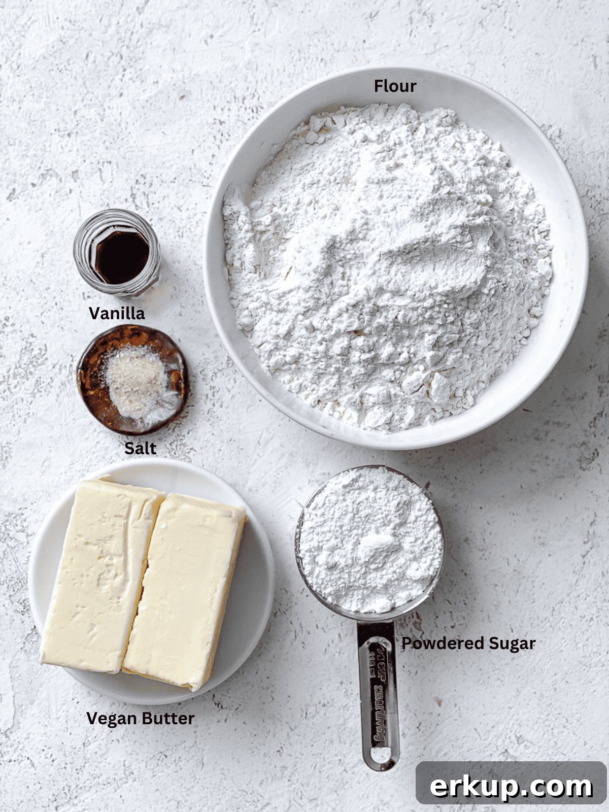 ingredients for Easy Snowball Cookies [Various Flavors] on a white surface