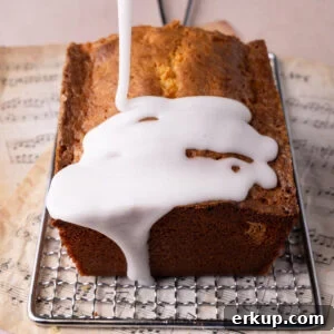 Silky Pourable Coconut Glaze for Cakes and Pastries 6 Pouring coconut icing over a pound cake to add moisture and tropical flavor.