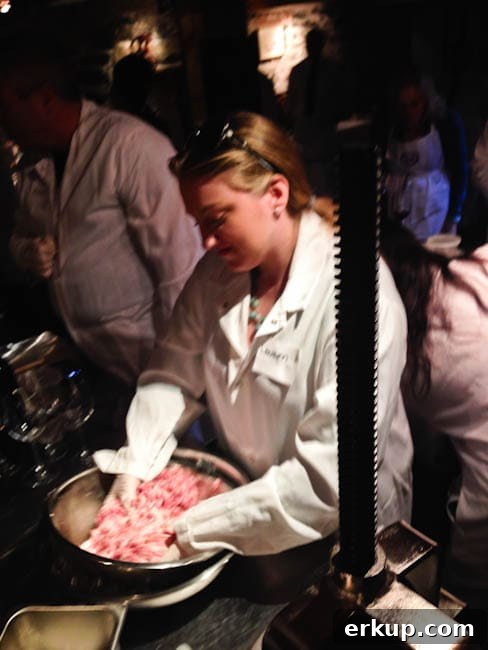 Mixing the sausage mixture.