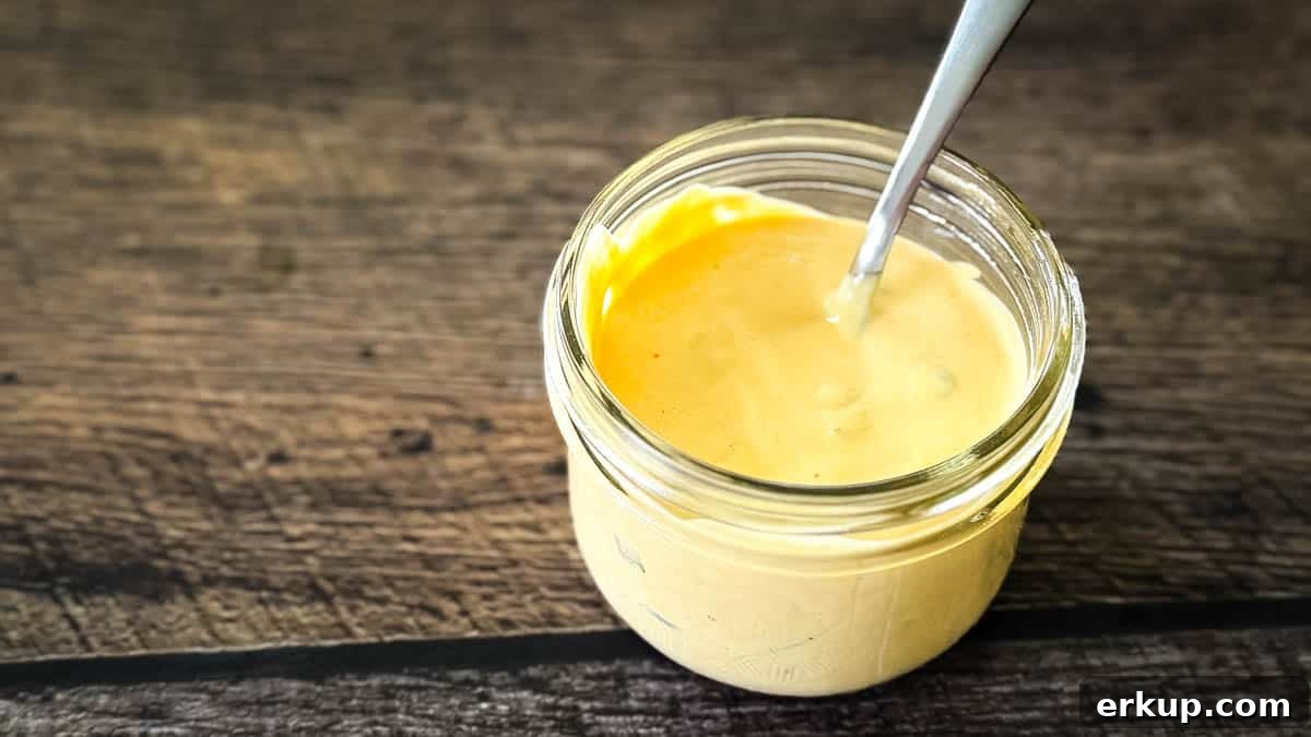Thick and tangy smash sauce in a glass jar, perfect for burgers and fries.