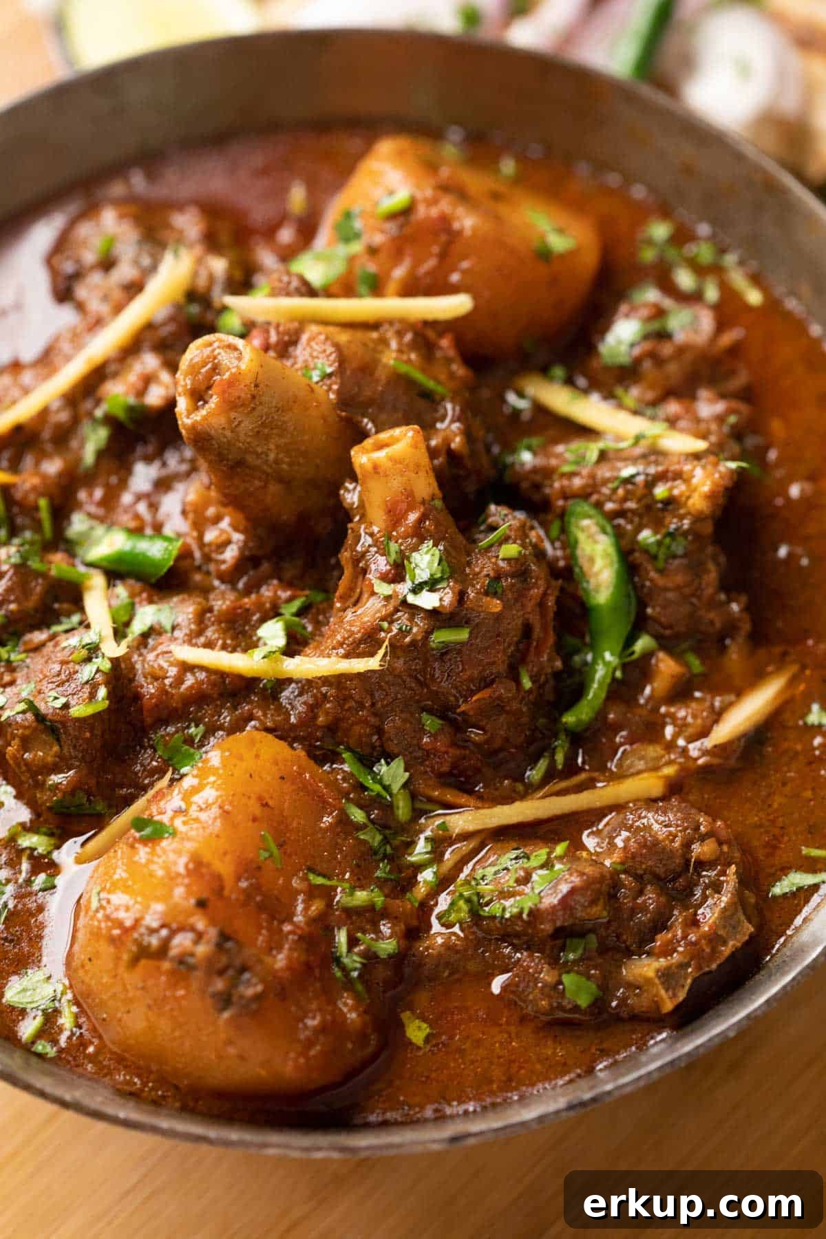 Pressure Cooker Mutton Curry: Lamb Curry Recipe 6 Close up of mutton shanks in the curry