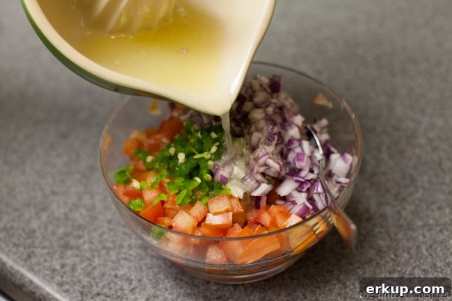 Totchos with a fried egg on top! from thelittlekitchen.net Mixing pico de gallo
