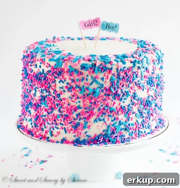 Tall 6-layer white cake covered with sweet and tangy cream cheese frosting and filled with colorful candies and sprinkles inside. Deliciously fun way to reveal the gender of a new bundle of joy!