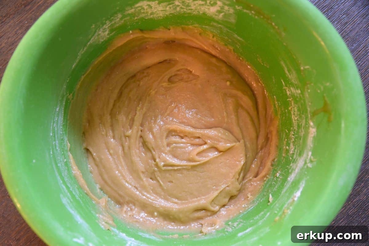 Red, White and Blue Blondies Recipe for Fourth of July 7 blondie batter in green bowl