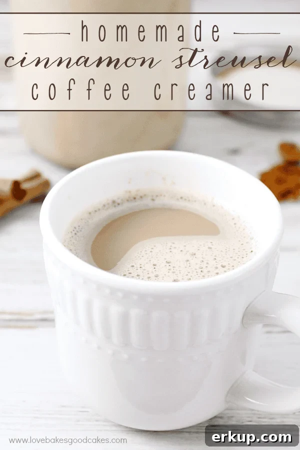 A cup of coffee in a white cup showing the top of the cup.