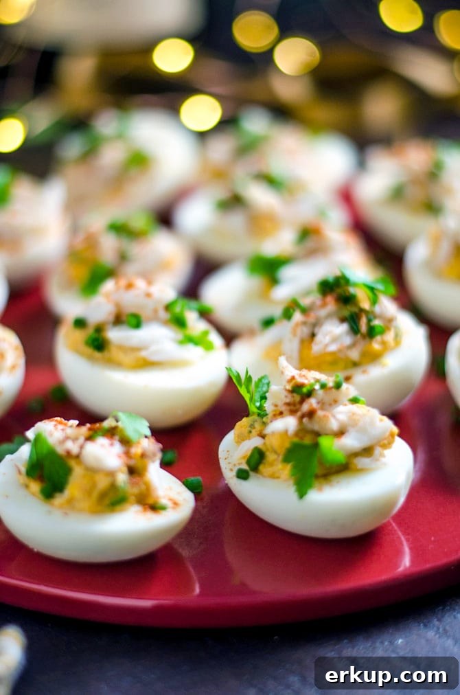 Deviled eggs topped with lump crab meat