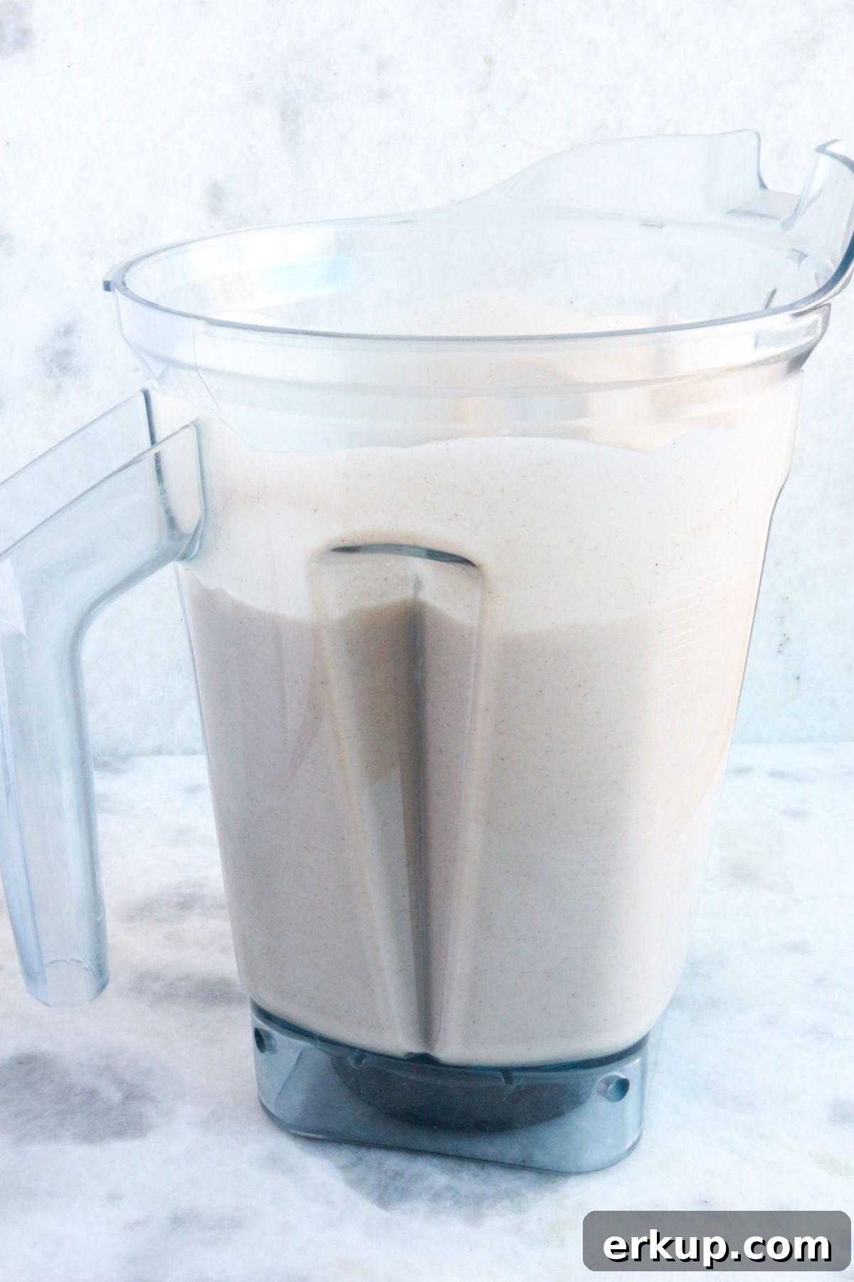 Creamy Vegan Coquito Recipe for the Holidays 5 A blender full of vegan coquito.