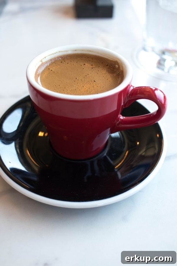 Greek Coffee: Your Guide to Coffee Culture in Greece 2 Greek coffee in a small red espresso cup, how to enjoy coffee in Greece!