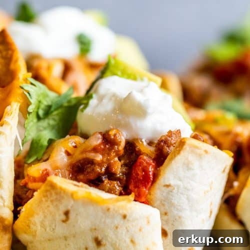 Strait on shot of taco cup on gray platter.