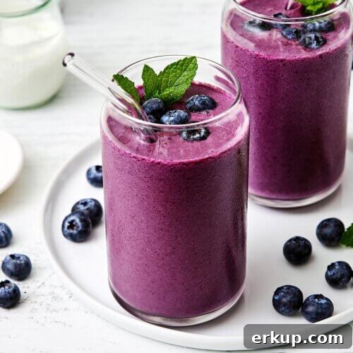 Glasses of blueberry smoothie.